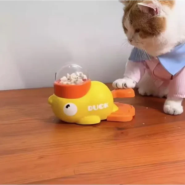 ''Yellow Duck-Shaped Interactive Feeder for Dogs and Cats: A Treat-Dispensing Puzzle Toy Designed for Pet Training'' - Image 5